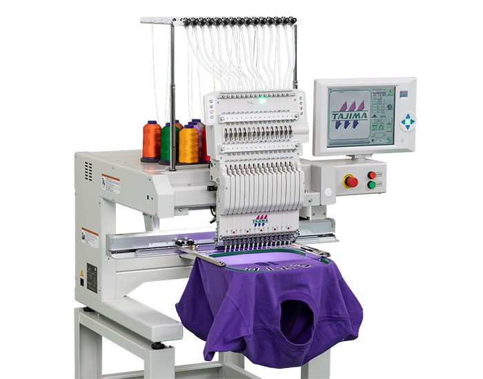 A machine with purple fabric hanging from it.